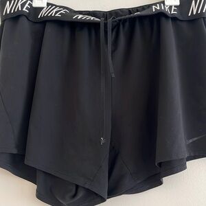 Nike size XXL athletic shorts with Nike branding at waist, draw string